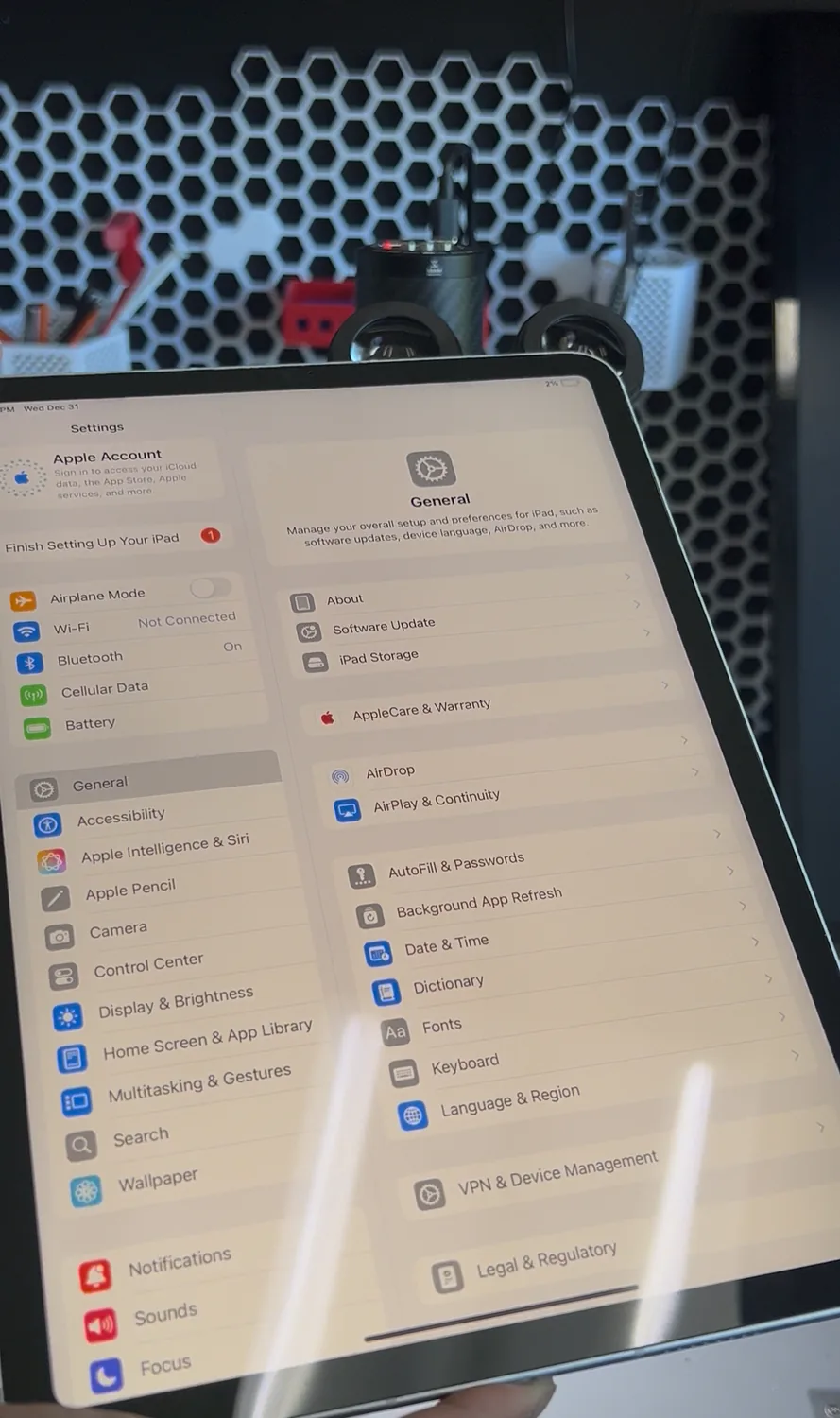 The repaired iPad with new glass and its original display, working like new