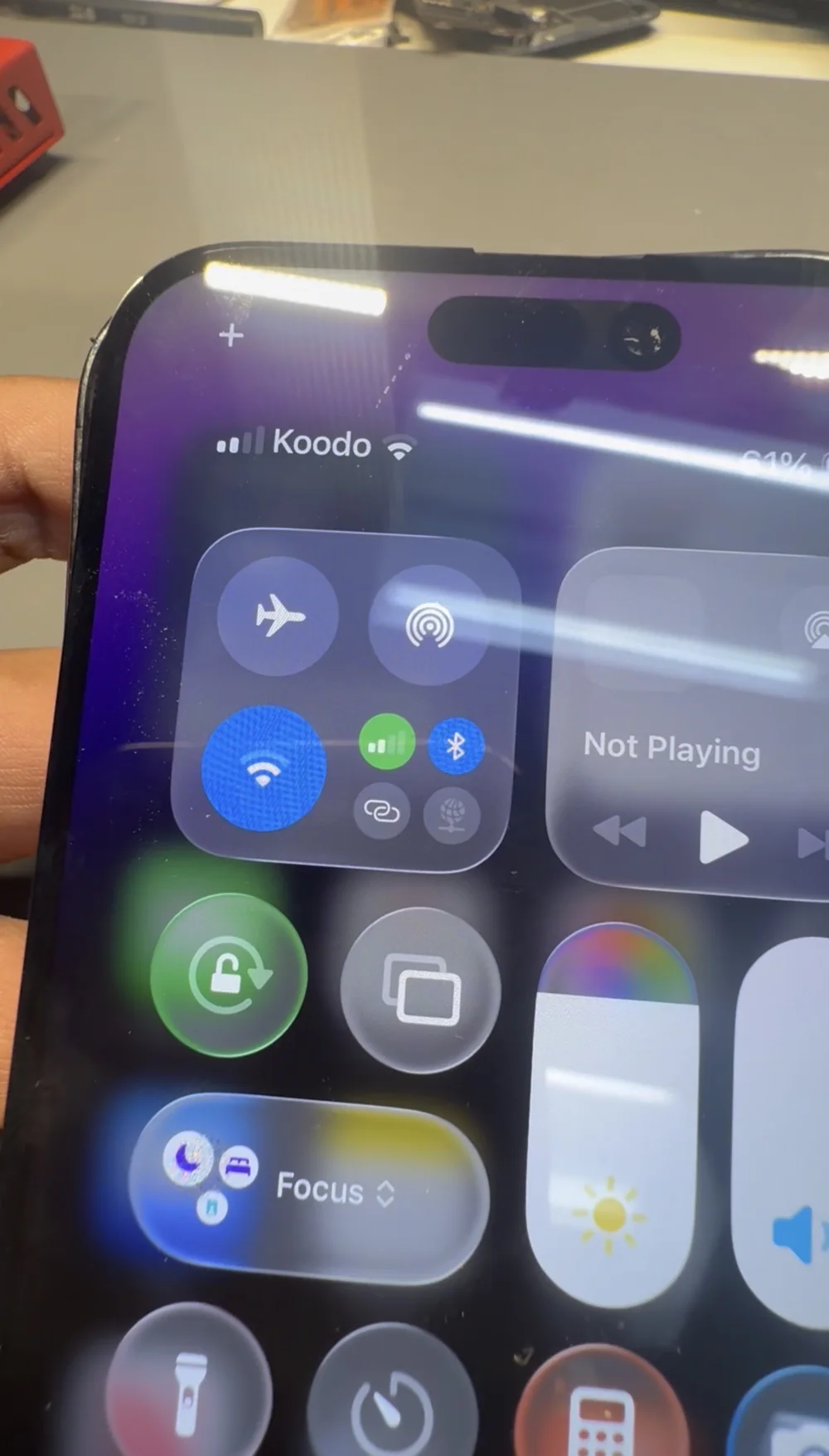 iPhone 14 Pro Max showing carrier name and signal bars after a baseband transfer