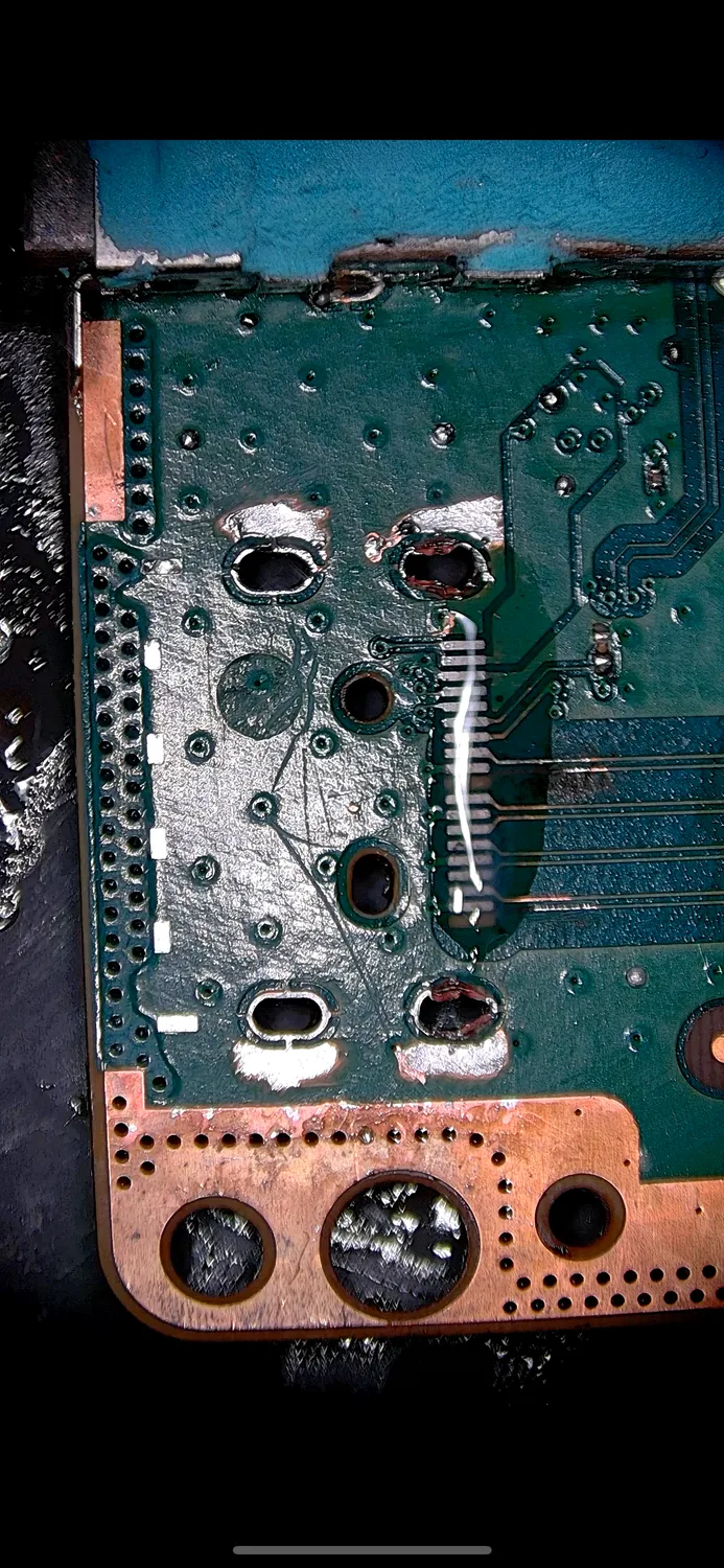 The Xbox HDMI footprint cleaned and rebuilt under the microscope