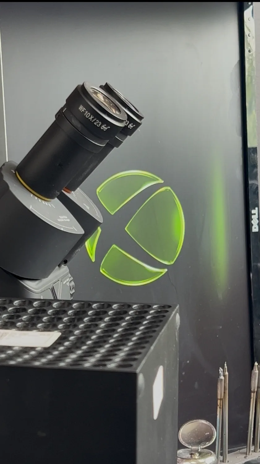 The repaired Xbox Series X booting to the green Xbox logo on screen, HDMI restored